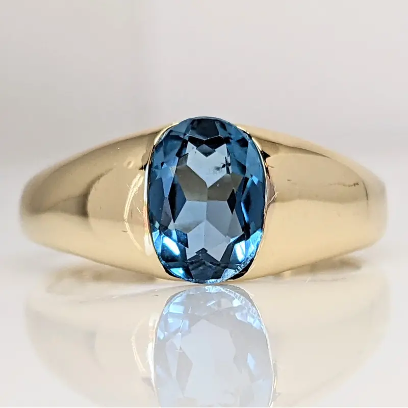 14K BLUE TOPAZ OVAL 5X8 HALF- BEZEL ESTATE RING 2.0 GRAMS