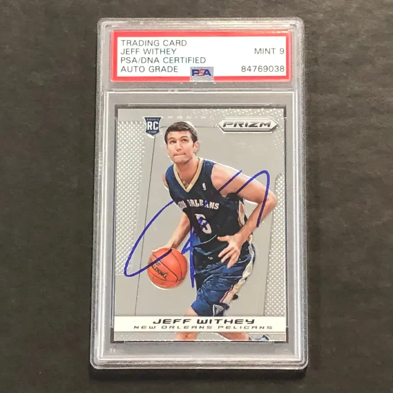 2013-14 Panini Prizm Red #296 Jeff Withey Signed Card AUTO 9 PSA Slabbed RC Pelicans