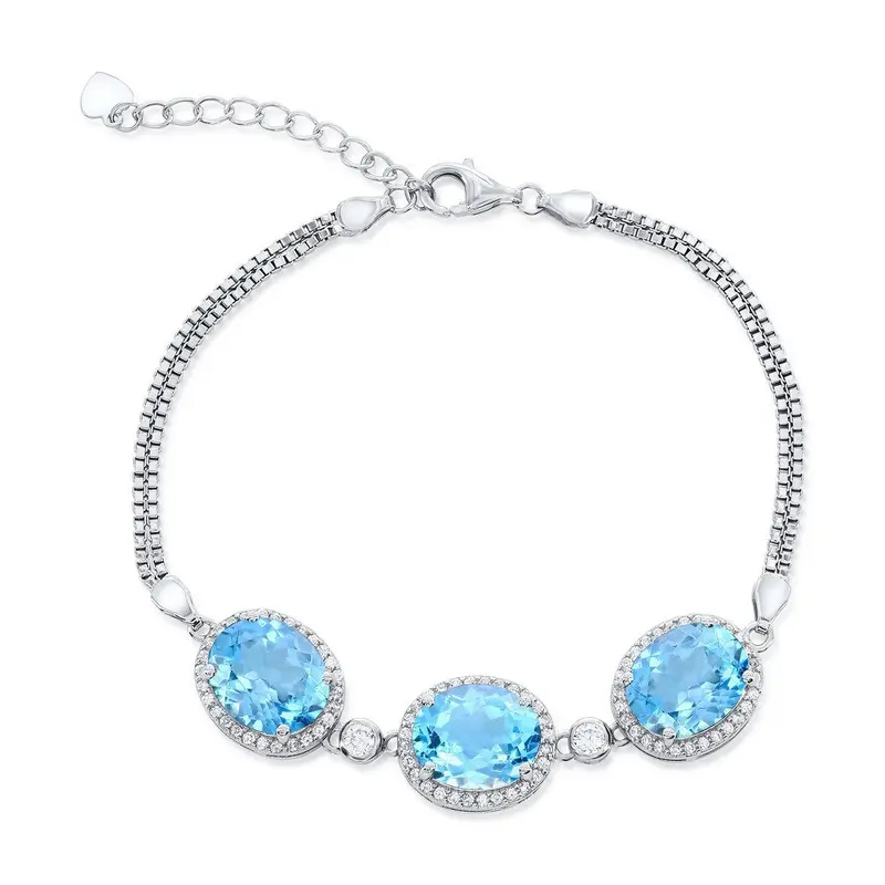 Sterling Silver, White Topaz Border, Oval Gemstone Bracelet - Blue Topaz (13.34cttw)