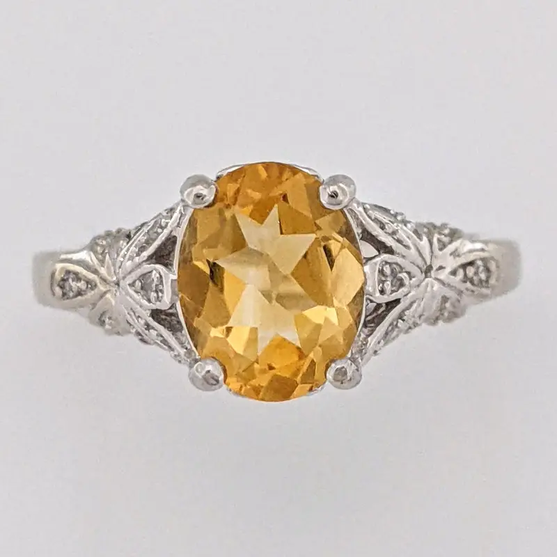 10K WHITE CITRINE OVAL 7X9 WITH MELEE ESTATE RING 3.8 GRAMS